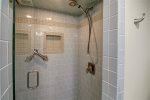 Large walk-in shower in the master bathroom.